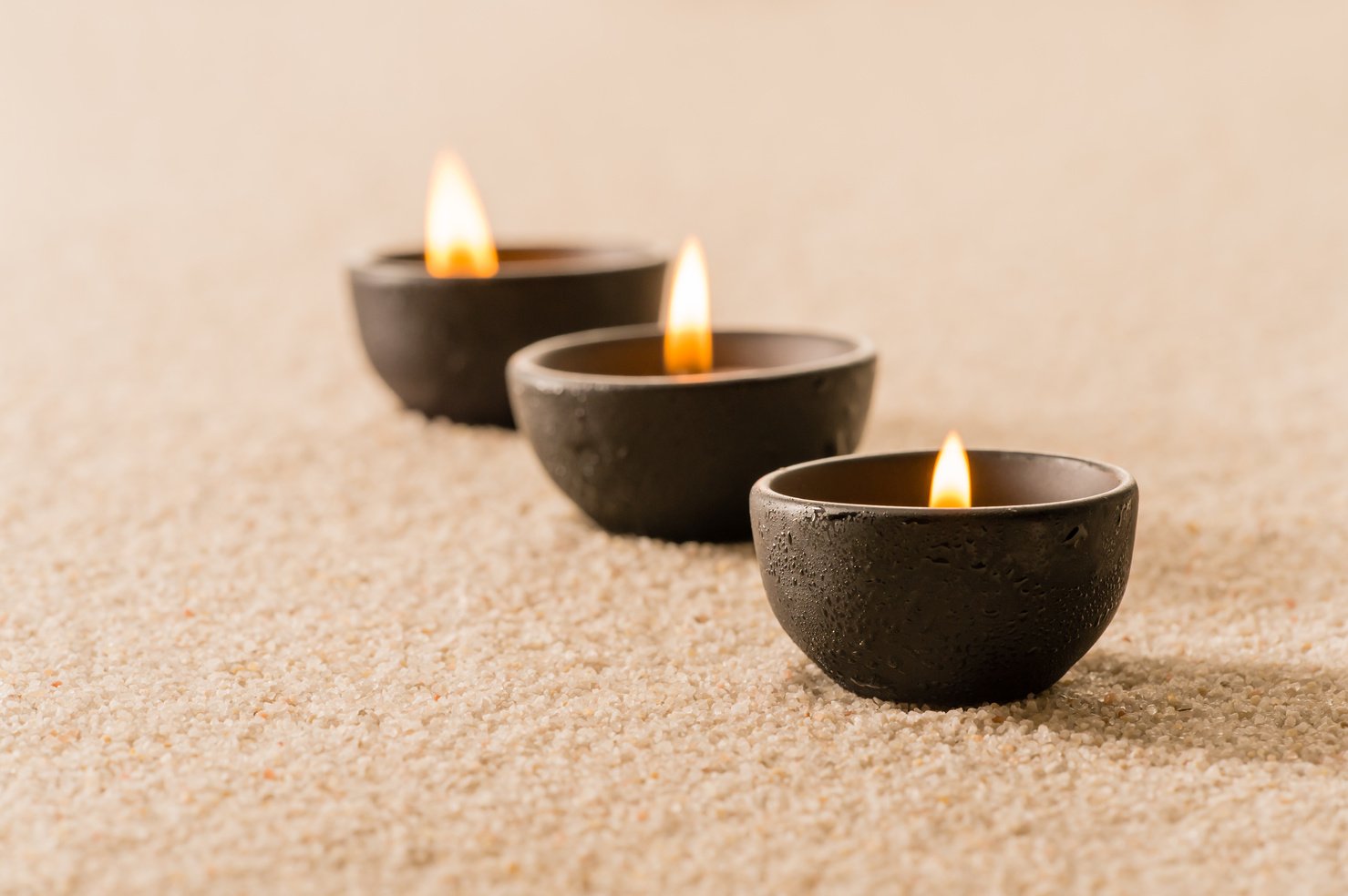 Spa Therapy Three Candles on Sand